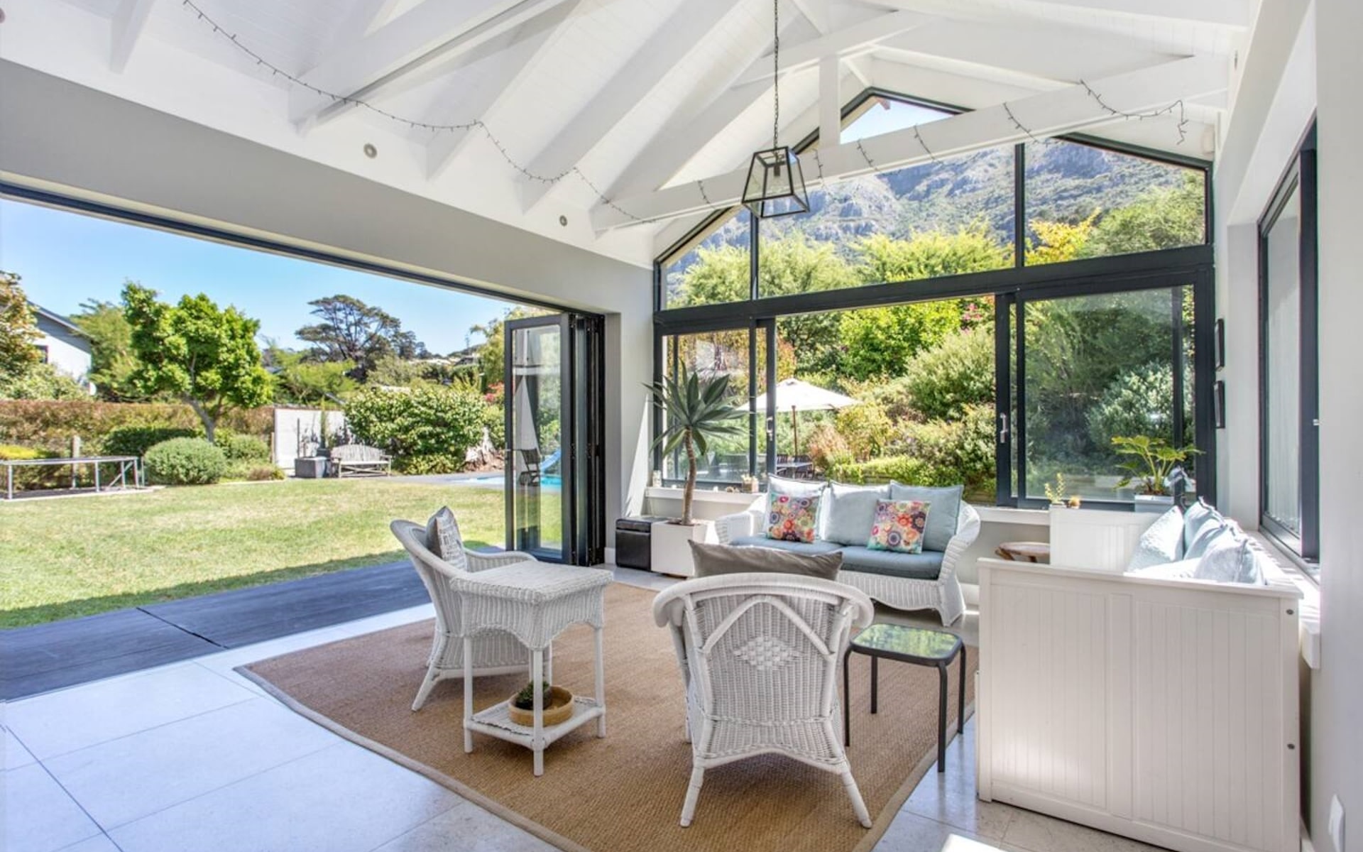 Luxury family home rental in Hout Bay with light and airy living room